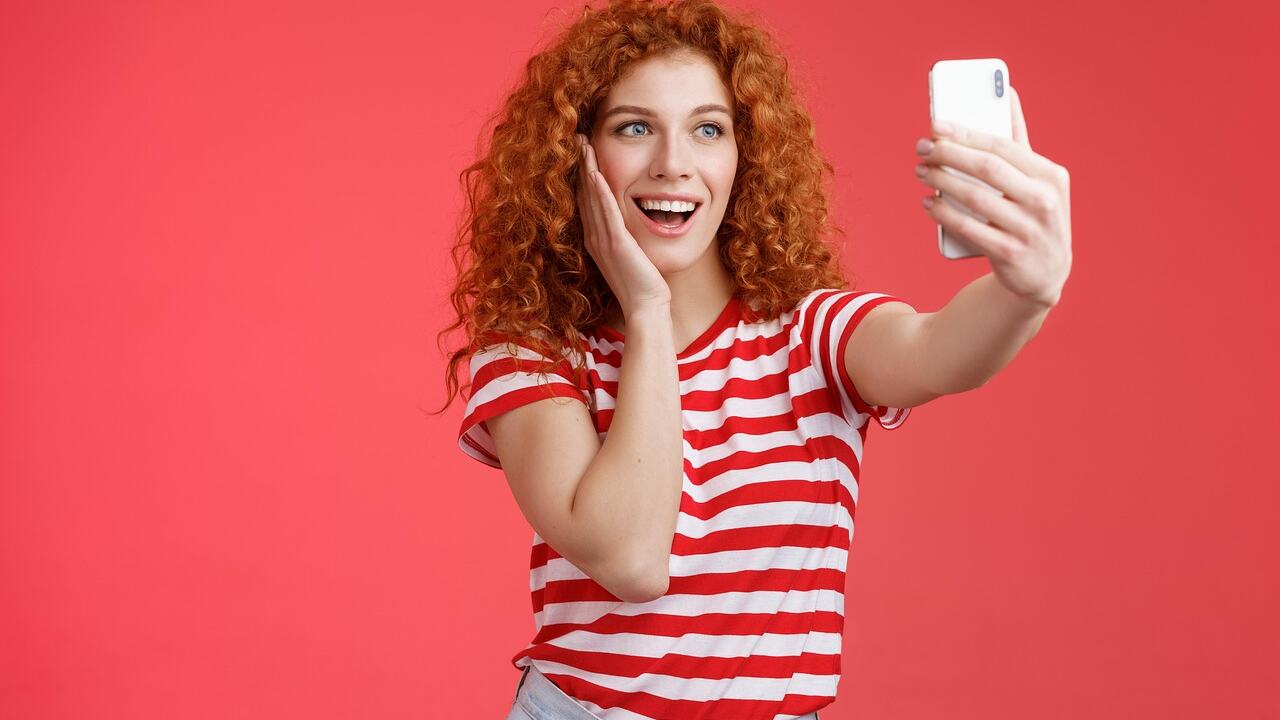 Person reading tech news on a smartphone