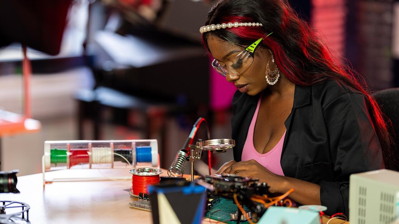 Circuit board and laptop on a workbench