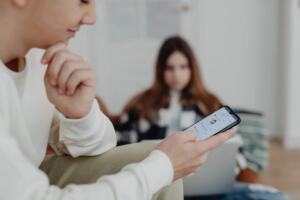 Person reading tech news on a smartphone